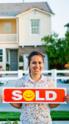 Girl Holding Sold Sign